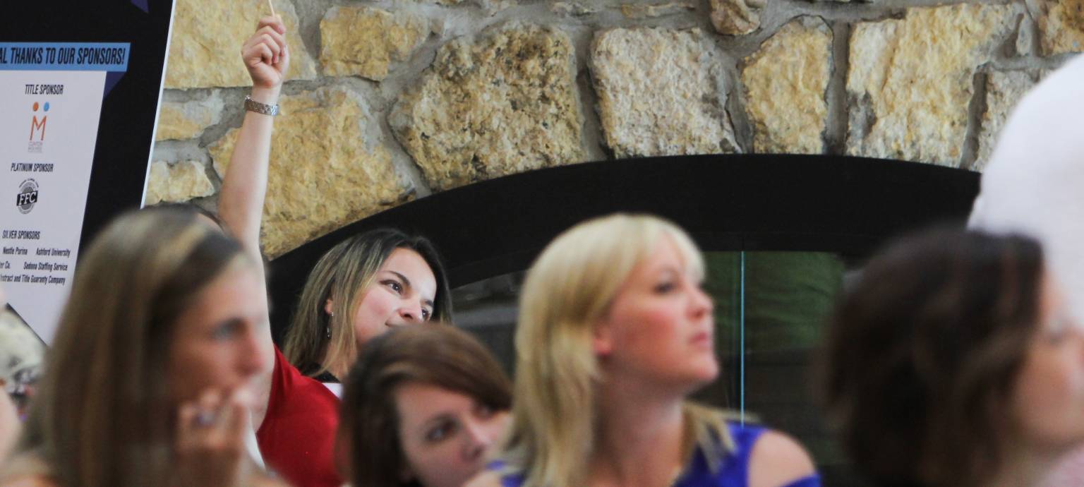 Women sitting at a meeting in Clinton Iowa